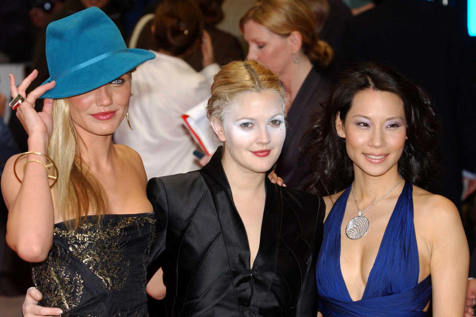 Cameron Diaz, Drew Barrymore and Lucy Liu, arriving at The Odeon Leicester Square, London, for the UK premiere of Charlie's Angels: Full Throttle.   (Photo by Andy Butterton - PA Images/PA Images via Getty Images)