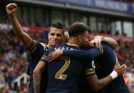 Britain Soccer Football - Stoke City v Tottenham Hotspur - Premier League - bet365 Stadium - 10/9/16 Tottenham's Dele Alli celebrates scoring their third goal with team mates Reuters / Peter Nicholls Livepic