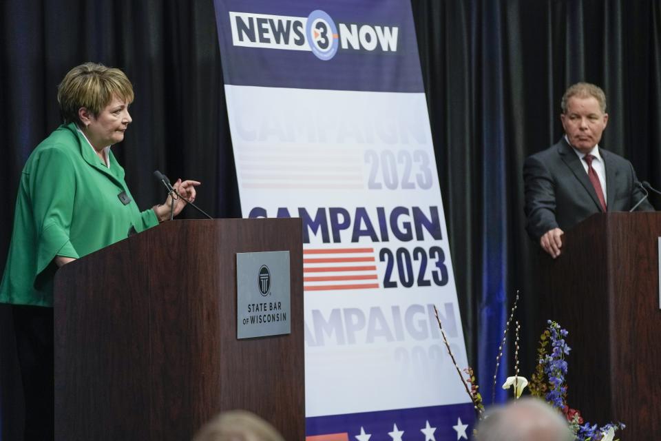 Wisconsin Supreme Court candidates Republican-backed Dan Kelly and Democratic-supported Janet Protasiewicz participate in a debate Tuesday, March 21, 2023, in Madison, Wis. (AP Photo/Morry Gash)