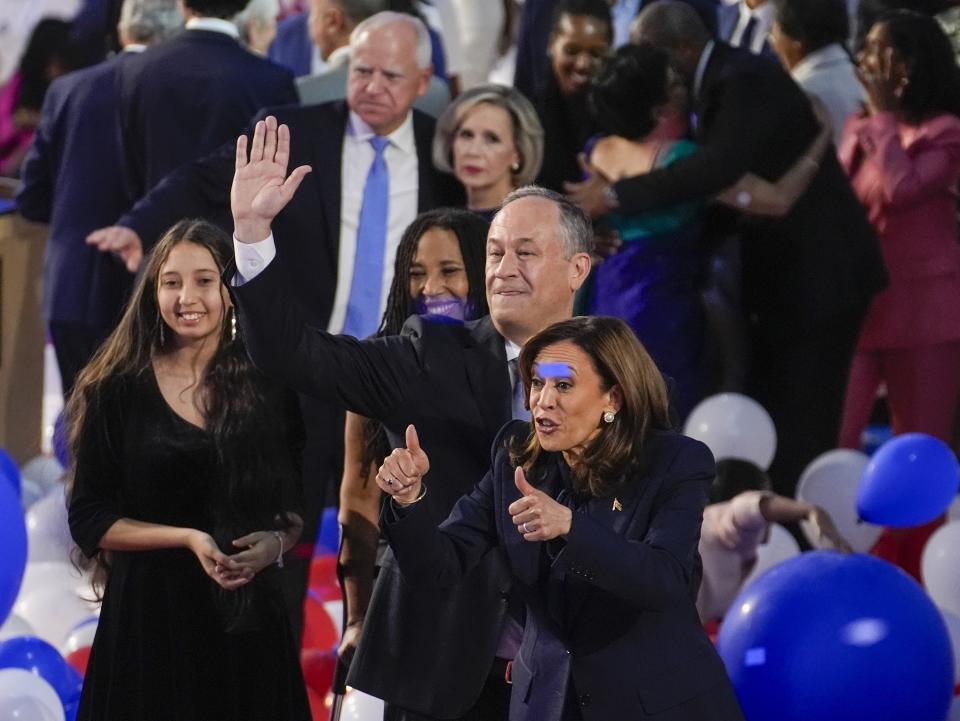 Democratic presidential nominee Vice President Kamala Harris and second gentleman Doug Emhoff during the Democratic National Convention Thursday, Aug. 22, 2024, in Chicago. (AP Photo/Charles Rex Arbogast)