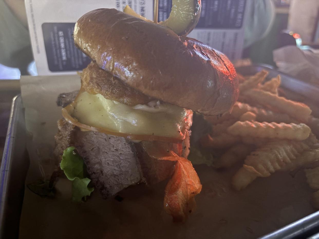 If you're hungry, order the Smokehouse Burger at Soggy Peso, 11355 Pellicano Drive. The burger is juicy, flavorful and a handfull, stacked high with brisket, bacon, gouda cheese, a crispy onion ring and some whiskey barbecue sauce.