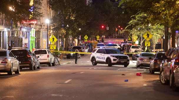 PHOTO: The scene of a mass shooting is cordoned off by law enforcement in Over-the-Rhine, Cincinnati, Aug. 7, 2022. (Liz Dufour/Cincinnati Enquirer via USA Today Network)