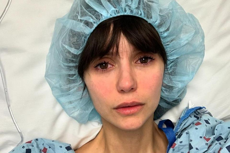 Nina Dobrev in hospital gown and cap as she gives fans a surgery update (Instagram / Nina Dobrev)