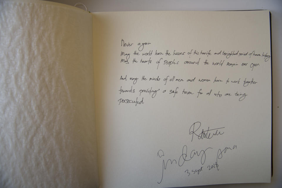 The text written and signed by Philippine President Rodrigo Duterte in the guest book of Yad Vashem, Holocaust Memorial in Jerusalem, Monday, Sept 3, 2018. (AP Photo/Oded Balilty)