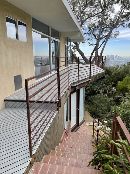 The renovation wanted to still capitalize on the view, with new decking throughout.