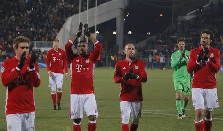 Football Soccer - FC Rostov v FC Bayern Munich - UEFA Champions League Group Stage - Group D - Olimp 2 Stadium, Rostov-on-Don, Russia - 23/11/16. Bayern Munich's Douglas Costa, Franck Ribery with their team mates leave the pitch following their defeat by FC Rostov. REUTERS/Maxim Shemetov