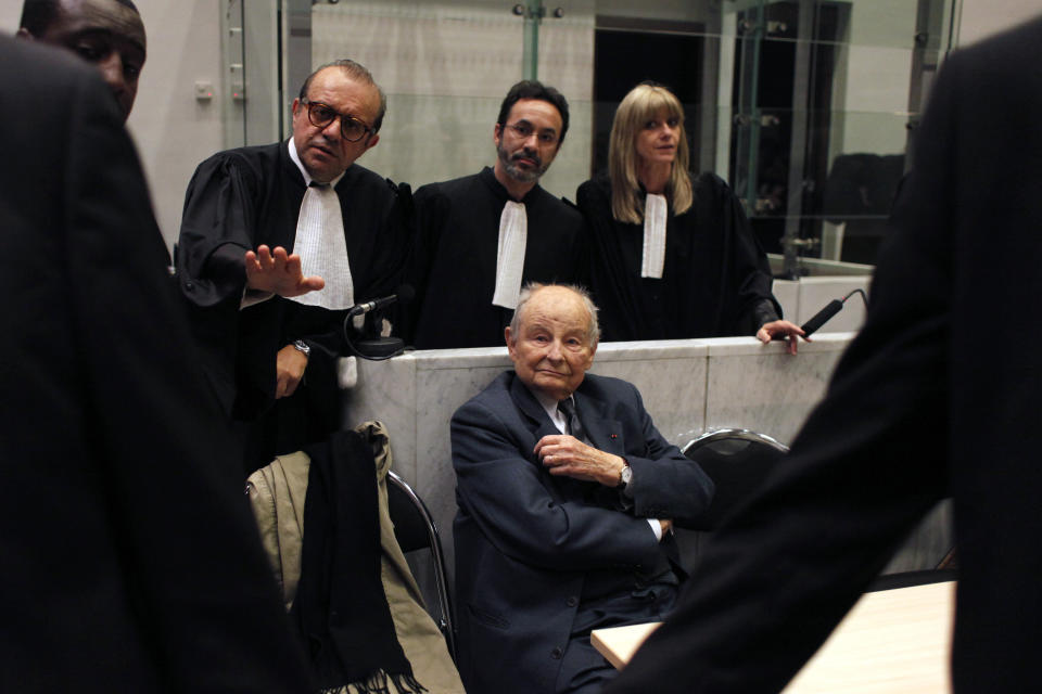 FILE - In this May 21, 2013 file photo, Jacques Servier, founder of Servier Laboratories, sits during the opening of the trial regarding Mediator, a diabetes drug linked to hundreds of deaths, at Nanterre's court house, outside Paris. A Paris court will deliver its verdict Monday, March 29, 2021 in a case that grew into one of France’s biggest modern health scandals, ruling whether a French pharmaceutical company is guilty of manslaughter and other charges for selling a diabetes drug blamed for hundreds of deaths. Accused of favoring profits over patients’ lives, Servier Laboratories is facing millions of euros in potential fines and damages after a huge trial involving 6,500 plaintiffs. The company’s CEO and founder, Jacques Servier, was indicted early in the legal process but died in 2014. (AP Photo/Thibault Camus, File)