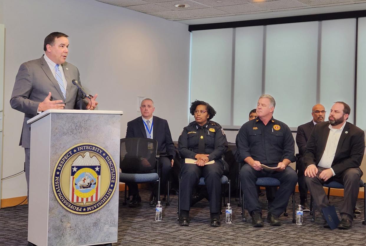Columbus Mayor Andrew J. Ginther, left, during a press conference with city public safety officials about crime statistics in 2022.