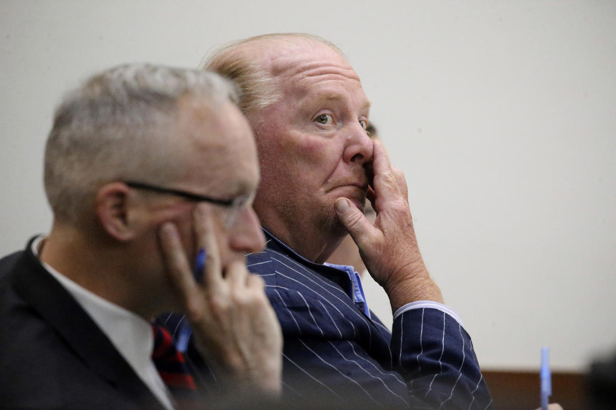 Celebrity chef Mario Batali listens during testimony at Boston Municipal Court on the second day of his sexual misconduct trial on Tuesday, May 10, 2022 in Boston. Batali pleaded not-guilty to a charge of indecent assault and battery in 2019, stemming from accusations that he forcibly kissed and groped a woman after taking a selfie with her at a Boston restaurant in 2017. (Stuart Cahill/The Boston Herald via AP, Pool)