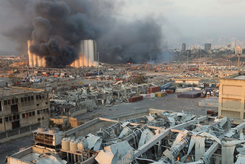 Smoke rises from the site of an explosion in Beirut