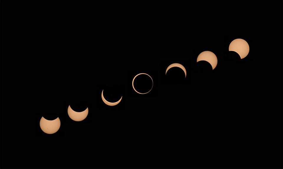 A compilation of images of a solar eclipse created by Chris Davis.