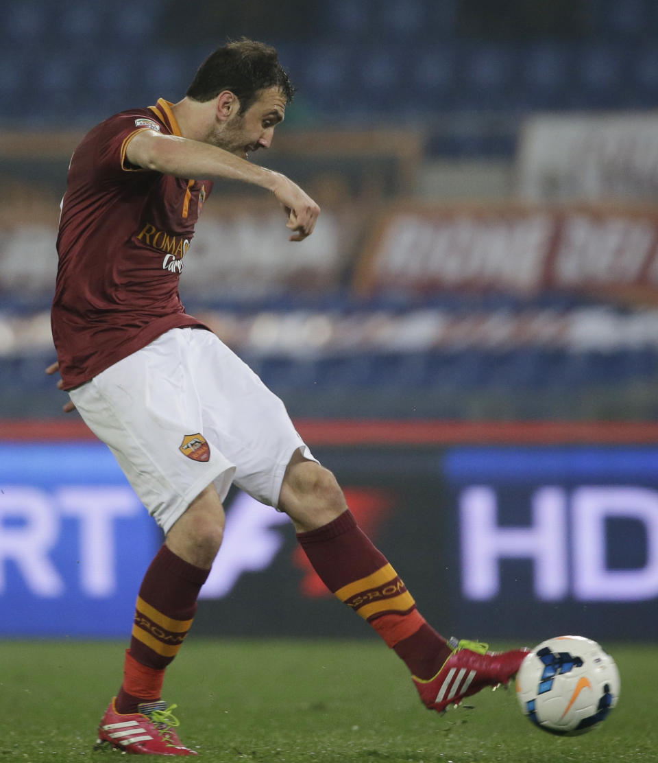 AS Roma's Vasilis Torosidis scores during a Serie A soccer match between AS Roma and Udinese in Rome's Olympic stadium, Monday, March 17, 2014. (AP Photo/Gregorio Borgia)