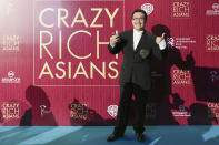 <p>Singaporean photographer Russel Wong poses for photographers at the Singapore premiere of ‘Crazy Rich Asians’ on 21 August 2018. (PHOTO: Yahoo Lifestyle Singapore) </p>