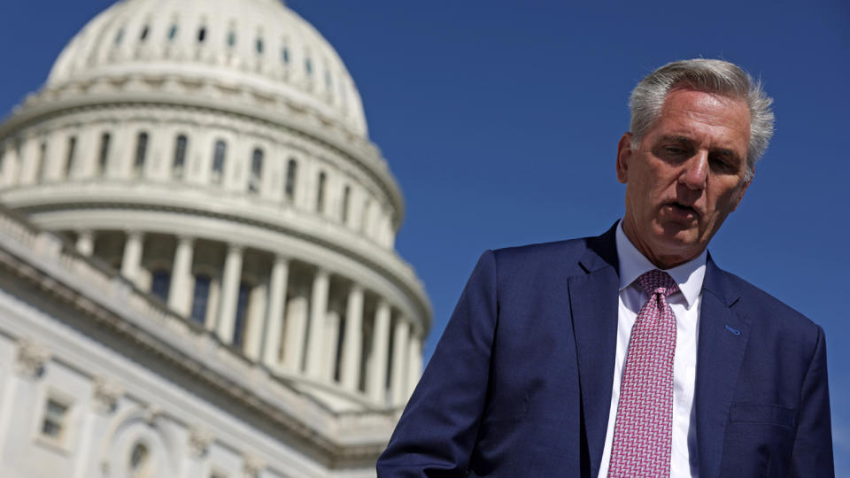 House Minority Leader Kevin McCarthy walks down the Capitol steps.