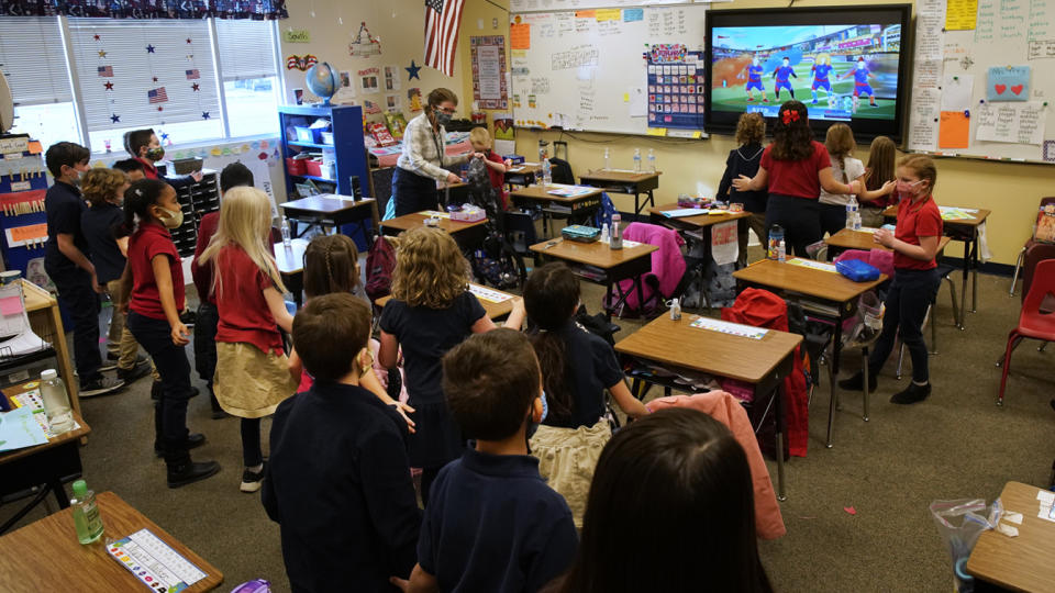 A teacher instructs students at Freedom Preparatory Academy on February 10, 2021 in Provo, Utah. (George Frey/Getty Images)