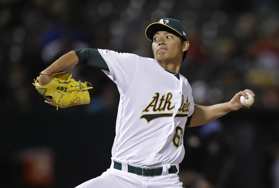 Oakland Athletics pitcher Wei-Chung Wang works against the Los Angeles Angels in the fifth inning of a baseball game, Tuesday, May 28, 2019, in Oakland, Calif. (AP Photo/Ben Margot)