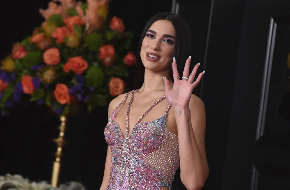 Dua Lipa arrives at the 63rd annual Grammy Awards at the Los Angeles Convention Center on Sunday, March 14, 2021. (Photo by Jordan Strauss/Invision/AP)