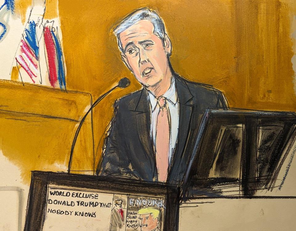 Michael Cohen testifies on the witness stand with a National Enquirer cover story (AP)