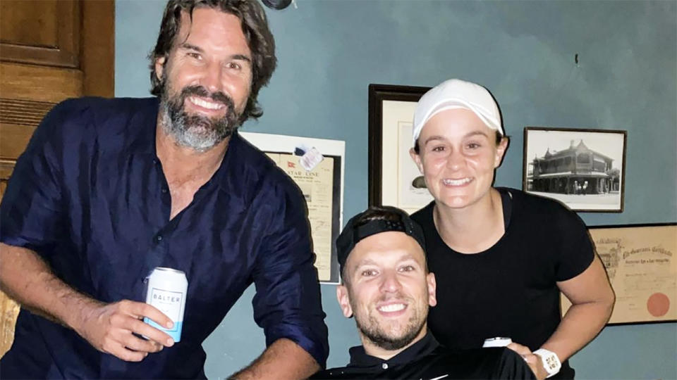 Pat Rafter, Dylan Alcott and Ash Barty, pictured here enjoying a beer.