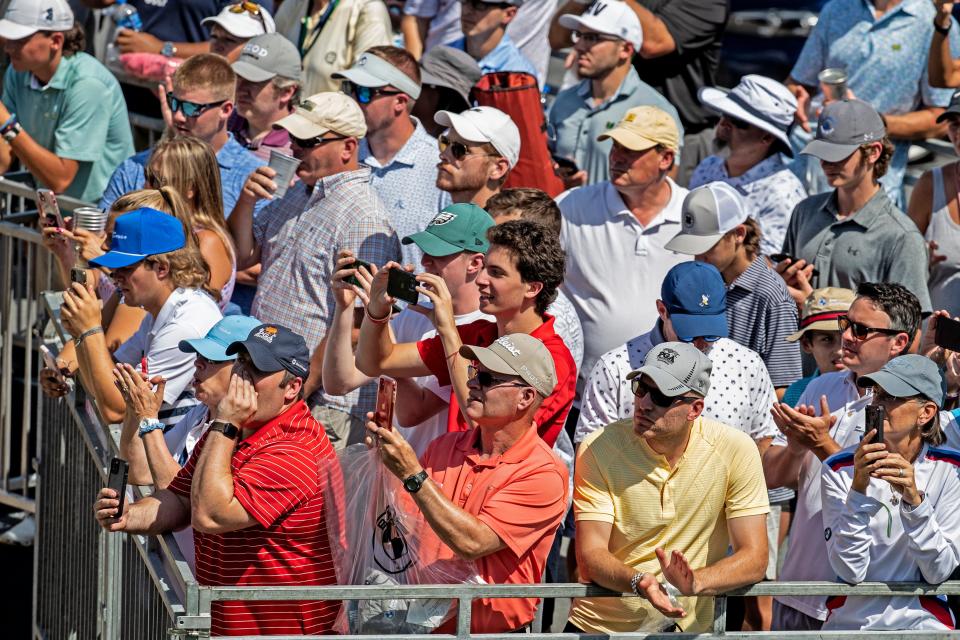 Golf fans watch the first round of the PGA Tour's BMW Championship at the Wilmington Country Club, the first ever PGA Tour event held in Delaware, on Thursday, Aug. 18, 2022.