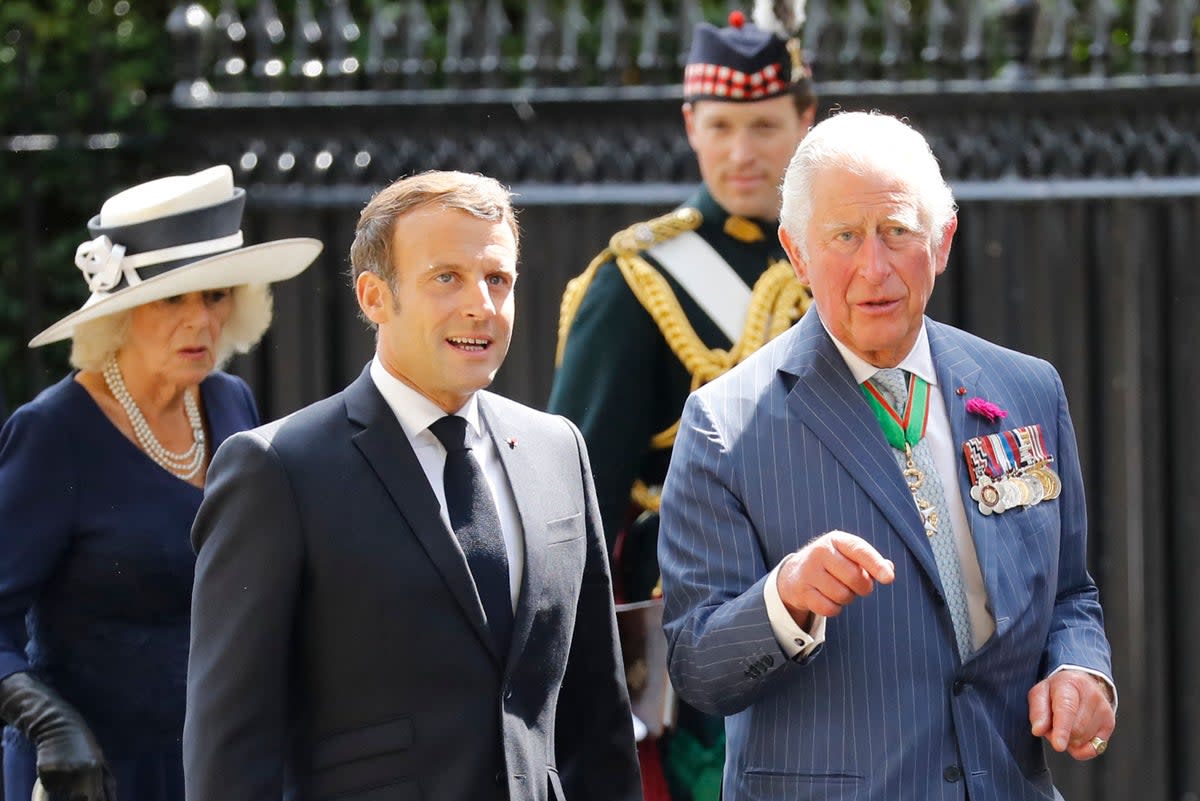 File picture of Emmanuel Macron with King Charles  in 2020  (POOL/AFP via Getty Images)