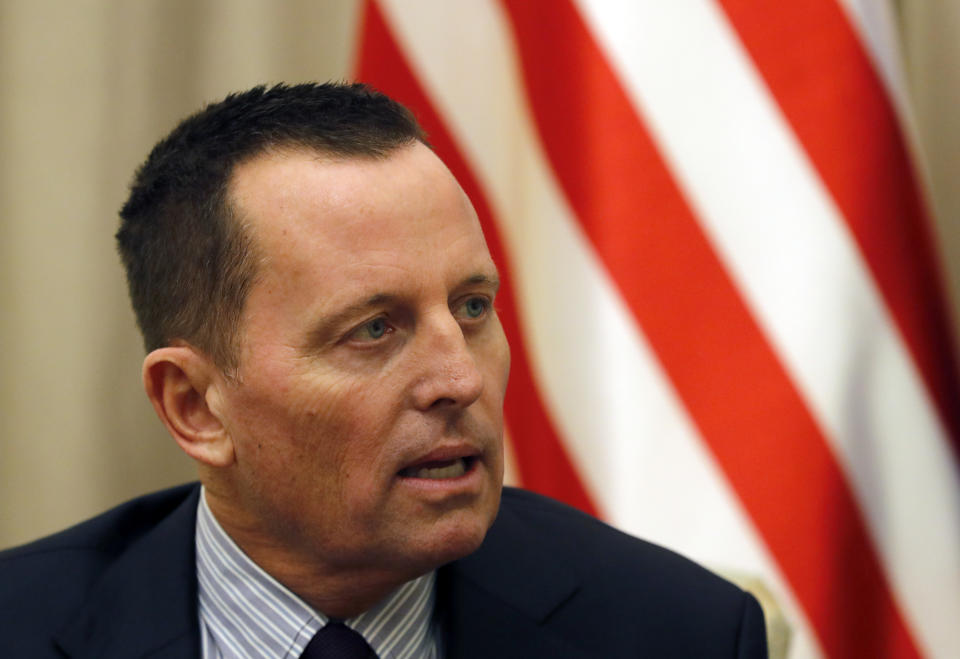 U.S President Donald Trump's envoy for the Kosovo-Serbia dialogue, Ambassador Richard Grenell, speaks with Serbian President Aleksandar Vucic during a meeting in Belgrade, Serbia, Thursday, Oct. 10, 2019. Grenell is meeting officials in Belgrade as part of a renewed effort to restart negotiations and resolve decades-long disputes between former war foes. (AP Photo/Darko Vojinovic)