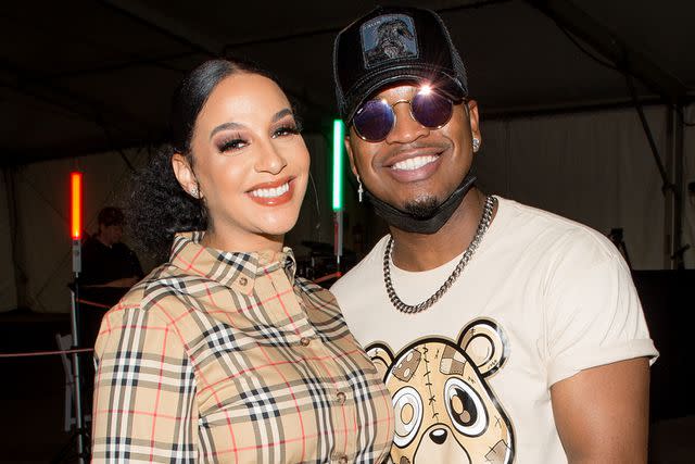 Marcus Ingram/Getty Crystal Smith and NE-YO in Atlanta in May 2021