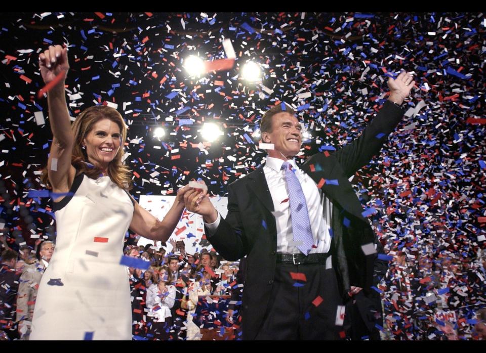 Republican Arnold Schwarzenegger is joined by wife Maria Shriver as he celebrates his victory in the California gubernatorial recall election in Los Angeles, Tuesday, Oct. 7, 2003. (AP Photo/Stephan Savoia)