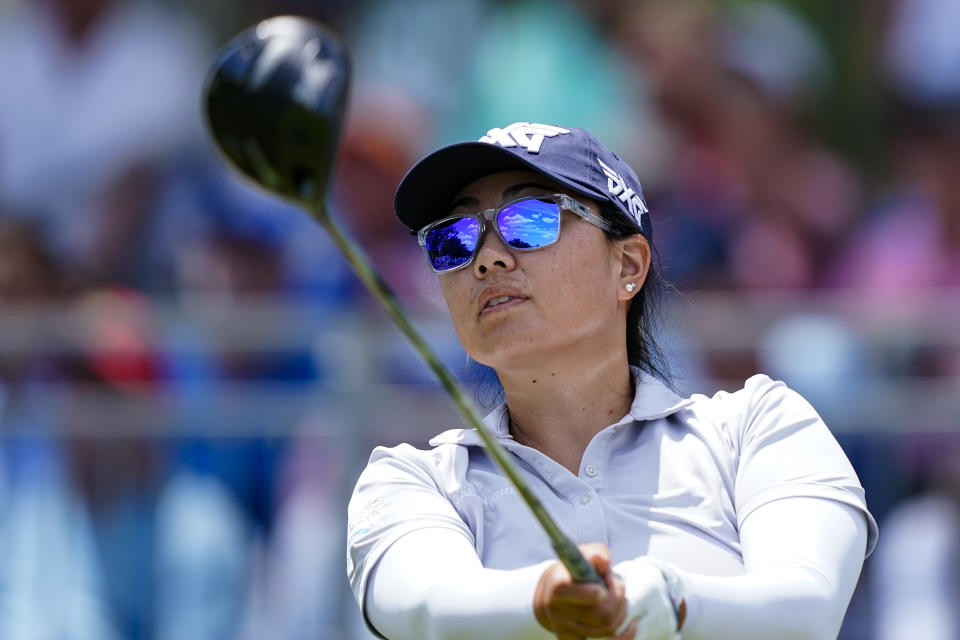 Mina Harigae follows her tee shot on the first hole during the first round of the ShopRite LPGA Classic golf tournament, Friday, June 10, 2022, in Galloway, N.J. (AP Photo/Matt Rourke)