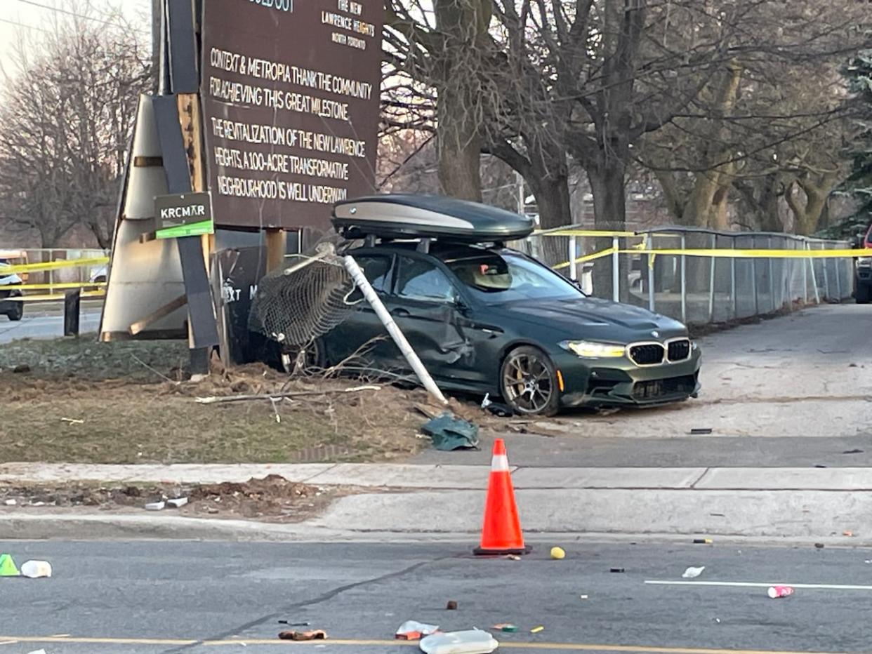 A crashed vehicle at the scene where a pedestrian was fatally struck in North York early Monday. (Spencer Gallichan-Lowe/CBC - image credit)