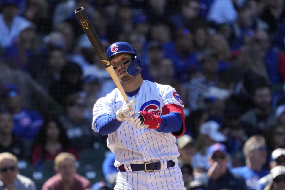 Chicago Cubs' Seiya Suzuki, of Japan, looks at his bat during the fifth inning of a baseball game against the San Diego Padres in Chicago, Thursday, April 27, 2023. (AP Photo/Nam Y. Huh)