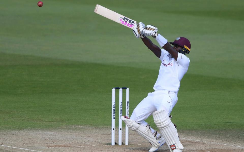 Jermaine Blackwood plays a shot during the fifth day of the first cricket Test match between England and West Indies - AP