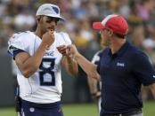 Aug 9, 2018; Green Bay, WI, USA; Tennessee Titans quarterback Marcus Mariota (8) gets a fist pump after playing the first series in game against the Green Bay Packers at Lambeau Field. Benny Sieu-USA TODAY Sports