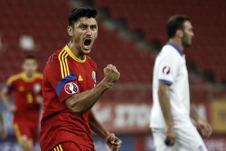 Romania's Ciprian Marica (L) celebrates after scoring a goal against Greece during their Euro 2016 qualifying soccer match at Karaiskaki stadium in Piraeus, near Athens, September 7, 2014. REUTERS/Alkis Konstantinidis (GREECE - Tags: SPORT SOCCER)