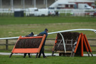 Ground staff pack away the hurdles at the end of the day after Wetherby Races is run behind closed doors due to Covid-19 at Wetherby Racecourse on March 17, 2020 in Wetherby, England. (Photo by Alex Livesey/Getty Images)