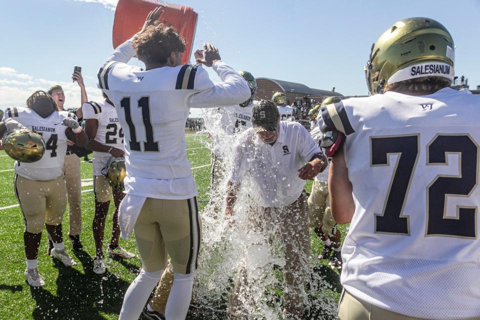 Coach Bill DiNardo celebrates win number 300 at St. Georges, a 16-14 victory, Saturday, September 24, 2022.