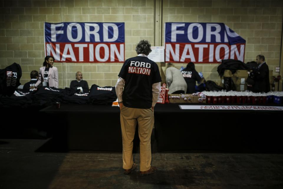 A man wears a Toronto Mayor Rob Ford campaign shirt during Ford's campaign launch party in Toronto