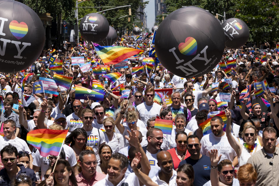 People participate in the LBGTQ Pride march Sunday, June 30, 2019, in New York. (AP Photo/Craig Ruttle)