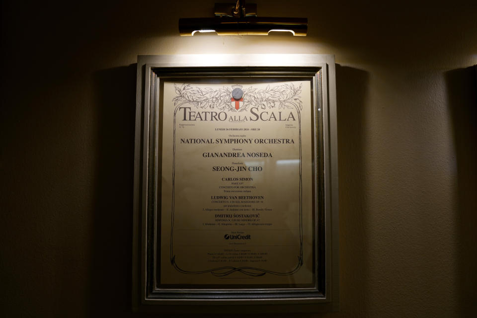 The poster for this evening's scheduled National Symphony Orchestra (NSO) concert at Milan's La Scala theatre, Italy, Monday, Feb. 26, 2024. (AP Photo/Antonio Calanni)