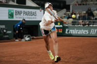 Barbora Krejcikova of the Czech Republic plays a shot against France's Diane Parry during their first round match at the French Open tennis tournament in Roland Garros stadium in Paris, France, Monday, May 23, 2022. (AP Photo/Thibault Camus)