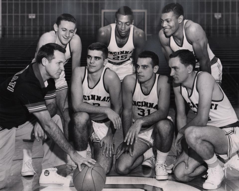 From Nov. 27, 1960: University of Cincinnati basketball coach Ed Jucker, left, has plenty of talent to use at guard as he takes over for George Smith. The half dozen backvourt men are (kneeling) Tom Sizer, Jim Calhoun and Carl Bouldin. Standing are Larry Shingleton, Tom Thacker (who also plays forward) and Tony Yates.
