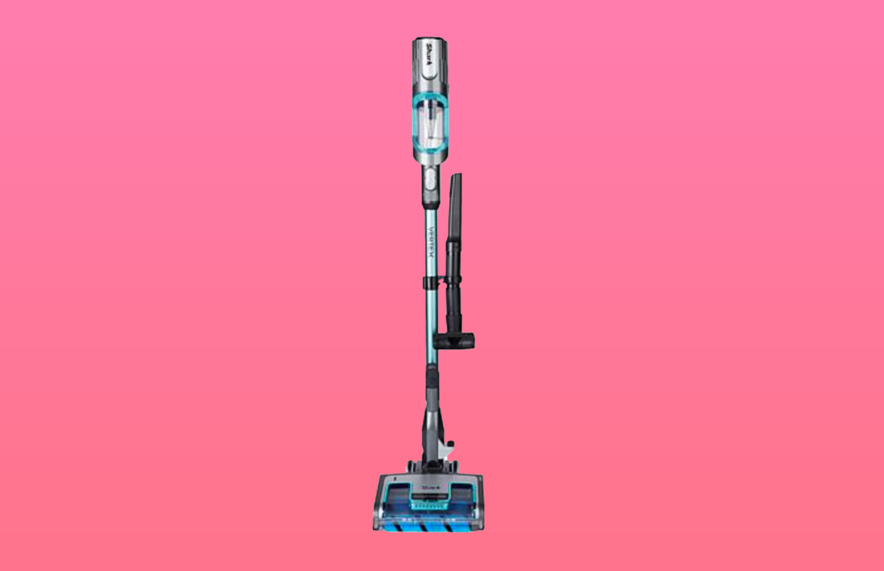 Stick vacuum with attachments on shaft. 