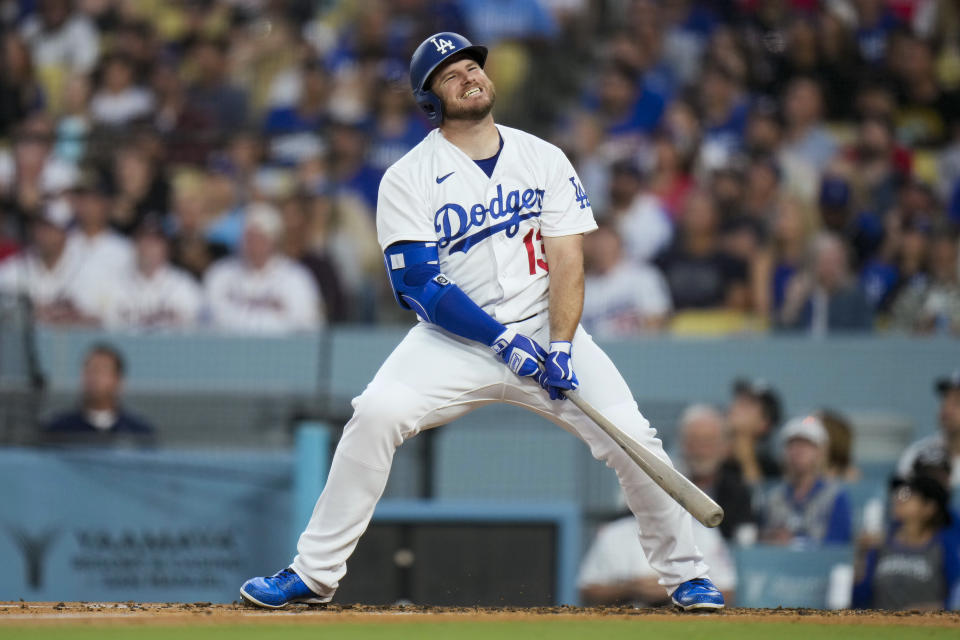 Los Angeles Dodgers' Max Muncy reacts after hitting a fly ball during the third inning of the team's baseball game against the Atlanta Braves on Saturday, Sept. 2, 2023, in Los Angeles. (AP Photo/Jae C. Hong)