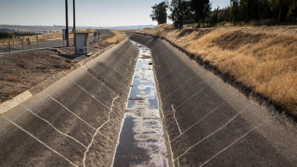 An empty Madera Canal, located at the base of the Friant Dam and Millerton Lake north of Fresno, Calif.