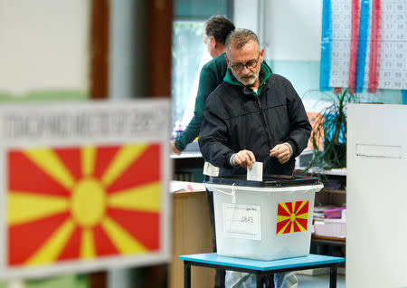 A man casts his ballot for the presidential election in Skopje, North Macedonia May 5, 2019. REUTERS/Ognen Teofilovski