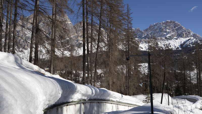 A view of the bobsled track in Cortina d’Ampezzo, Italy, Wednesday, Feb. 17, 2021. A big-ticket project for the 2026 Milan-Cortina Olympics has been dropped because the Italian government no longer wants to help fund it, organizing committee officials said on Oct. 16, 2023.