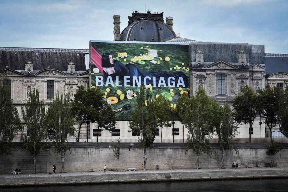 TOPSHOT - A picture taken on September 1, 2020, shows a billboard of the Balenciaga fashion brend featuring its new icon, US singer Cardi B, on a wall of the Louvre museum in Paris. (Photo by STEPHANE DE SAKUTIN / AFP) (Photo by STEPHANE DE SAKUTIN/AFP via Getty Images)