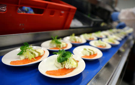 Meals for Lufthansa's first class passengers are prepared by employees of LSG Group, Lufthansa's airline catering division, at the LSG headquarters in Frankfurt, Germany, November 11, 2016. REUTERS/Kai Pfaffenbach