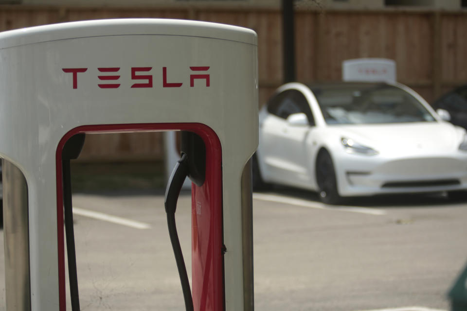 A Tesla Supercharger location is seen on Kipling Street, June 3, 2024, in Houston.  Charging stations have been hit particularly hard by thieves who likely want to sell the highly conductive copper wiring inside the cables at near-record prices.  But authorities and charging company officials say similar thefts are on the rise across the U.S. as more charging stations are built.  (AP Photo/Lekan Oyekanmi)