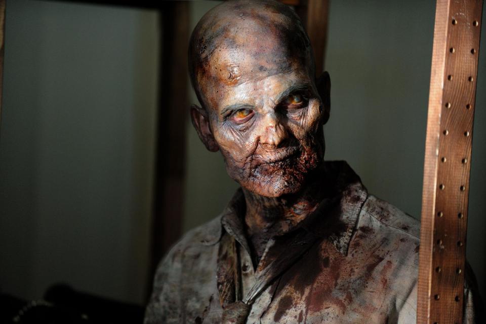 This undated publicity photo provided by AMC shows a zombie in a scene from AMC's TV show, "The Walking Dead," Season 3, Episode 1. The show airs Sundays at 9 p.m. EST on AMC. (AP Photo/AMC, Gene Page)